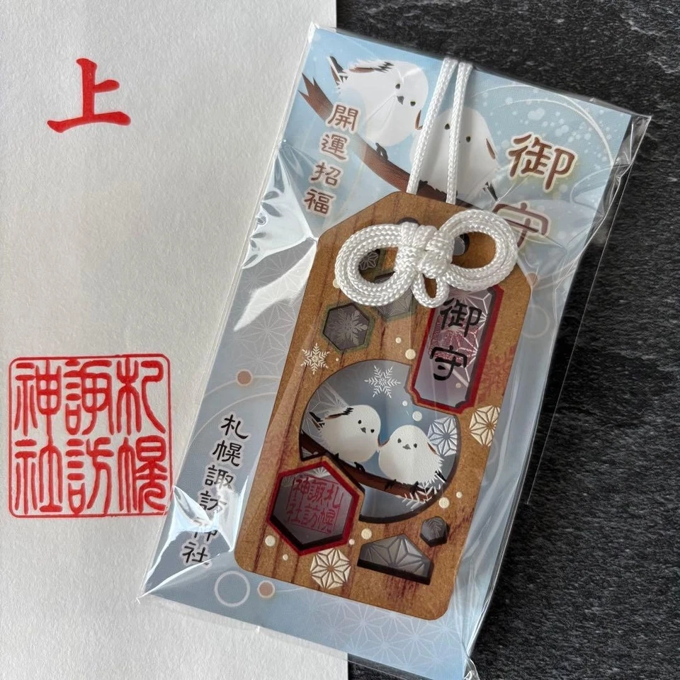 Amuleto de la suerte japonés Shimaenaga de madera Omamori buena suerte copo de nieve Foto 1 de 1