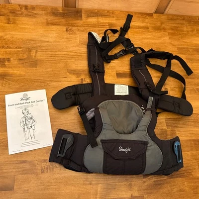Mochila portabebés suave Evenflo Snugli cara interior delantera y trasera 7-26 libras Foto 1 de 4