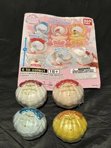 Sanrio Characters Shell Dresser - Set of 4 Bandai Gashapon Toy - New - Rare - Picture 1 of 3