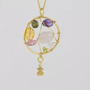 Colgante Tous en oro amarillo 18k y gemas Garabato - Imagen 1 de 15