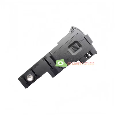 Adecuado para Panasonic DMC-FZ2000 FZ2500 compartimento de batería/cubierta/hebilla de bloqueo Foto 1 de 4