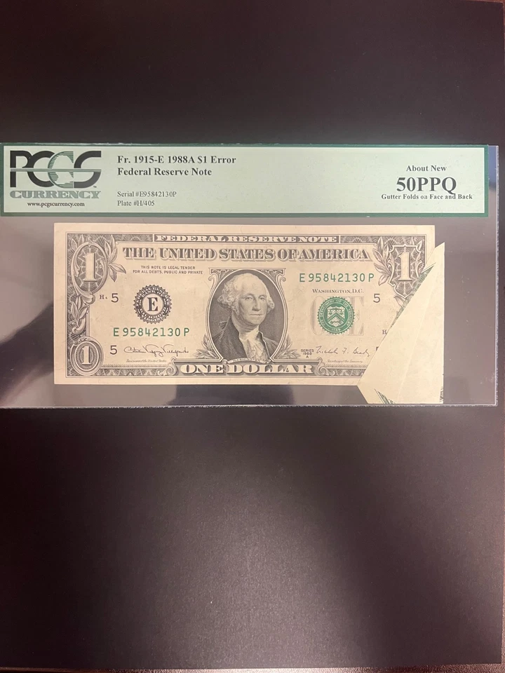1988 $1 Gutter Folds on Face and Back Graded 50 PPQ - Image 1 of 4