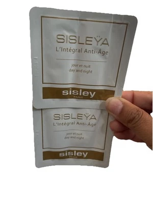 2x Sisley L’Integral amostra de creme antienvelhecimento dia e noite 0,06 oz/2 ml cada - Imagem 1 de 2