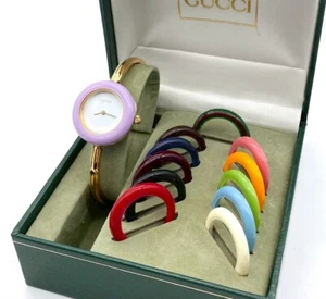 Gucci Change Bezel 12 Farben Weiß / Gold Zifferblatt Damenuhr mit Box funktioniert - Bild 1 von 7