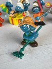 Farmer Smurf with green rake 20138