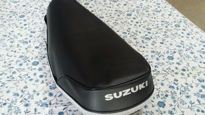 FUNDA ASIENTO SUZUKI TS100 TS125 MODELO 1973 A 1976 Funda asiento + correa (S67) Foto 1 de 4