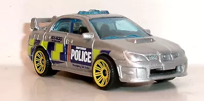 LOOSE 2019 MATCHBOX 1:64 MBX MULTIPACK SILVER 2007 SUBARU IMPREZA POLICE - Image 1 of 4