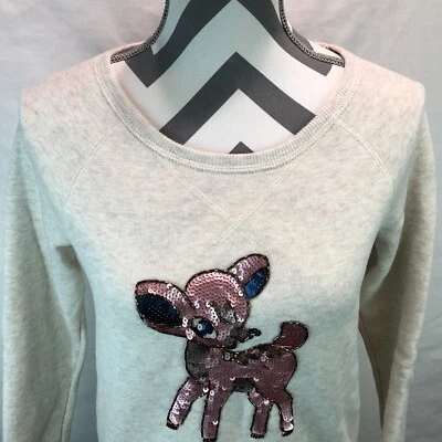 Sudadera polar American Eagle lentejuelas ciervo beige manga larga dobladillo abertura XS AA17 Foto 1 de 4