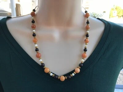 Handmade Necklace of Orange Quartz, Red Garnet Stones, and White MOP Shell Beads - Image 1 of 4