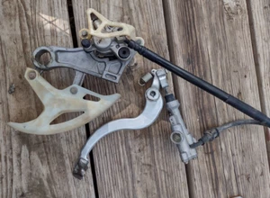 2010 Honda CRF250R rear brake assembly with pedal - Picture 1 of 2