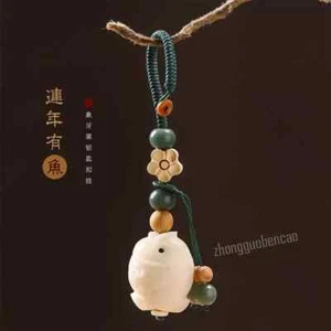 Year after year, there have been more elephant tooth fruit car keychain decorati - Picture 1 of 4