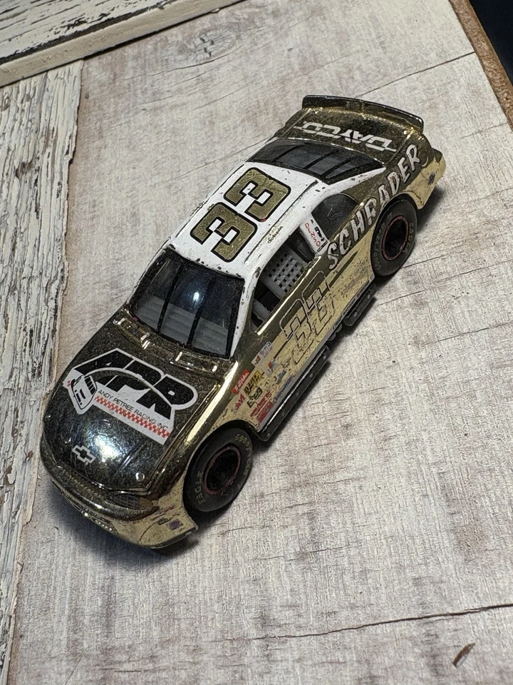 NASCAR Racing Champions Ken Schrader’s Chevy #33 Gold  1/64 Diecast Toy - Image 1 of 4