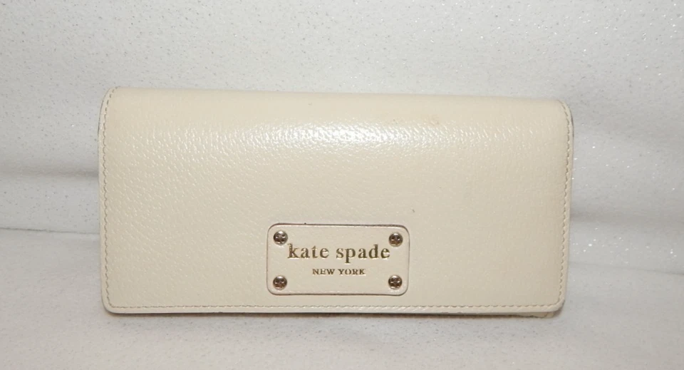 Cartera sin asas Kate Spade WLRU0786 Wellesley plegable de cuero blanco crema usada en excelente estado Foto 1 de 4