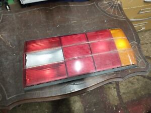1989 BMW 325i (E30) right side late model rear tail light, used, for parts only.
