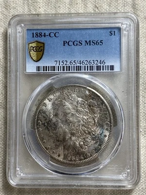 1884-CC Morgan Silver Dollar PCGS MS65 Toned Gold Shield - Image 1 of 4