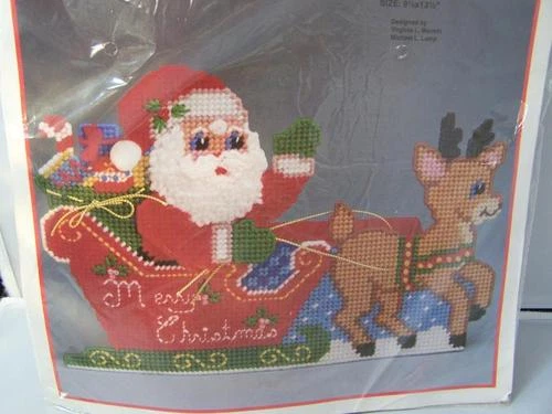 Bucilla Dashing Thru the Snow Door Stop- Plastic Canvas Kit #61114 Sealed Santa - Image 1 of 4