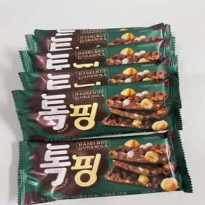 6x Orion Tokping Haselnuss Granola Milch Schokolade Snack süß 43g koreanisch - Bild 1 von 8