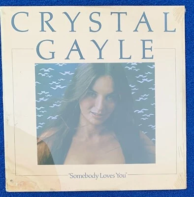 SEALED!! Crystal Gayle - Somebody Loves You - 1977 Vinyl LP Brand New - Image 1 of 2