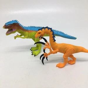 2 Electronic Roaring Dinosaurs - Both Make Sounds & 1 Lights Up  Approx. 6" tall - Picture 1 of 11