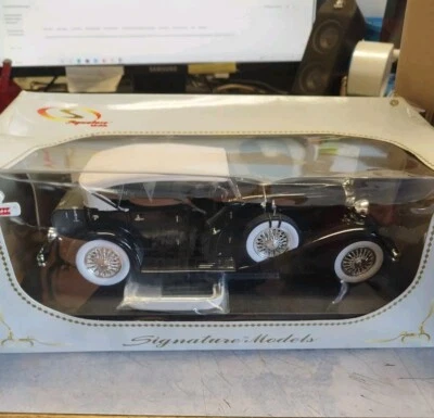 Signature Models 18110-s DUESENBERG 1934  Schwarz/weiß RARITÄT 1:18  - Bild 1 von 4