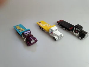 Corgi kenworth Flatbed Truck X 3 Misbehaving, Elf, Texaco - Picture 1 of 7
