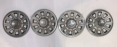 1965 - 1966 Pontiac Tempest OEM 14" Hubcaps Wheel Covers Set 09783391 - Image 1 of 4