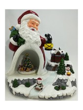 CARILLON CON LUCI LED E SINFONIA NATALIZIA. BABBO NATALE E TRENINO ROTANTE