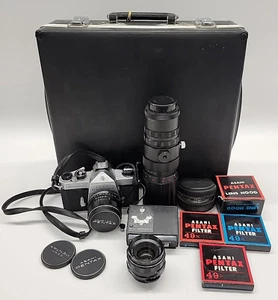 Pentax Spotmatic SP kit fotocamera pellicola 35 mm con 3 obiettivi, custodia rigida e accessori - Foto 1 di 24