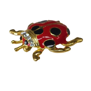 Broche prendedor Bobbie Brooks Ladybug rojo negro esmalte diamantes de imitación transparentes tono dorado - Imagen 1 de 3