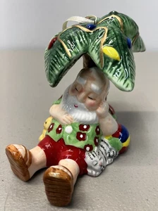 Santa Ornament Or Shelf Sitter Sleeping Under Palm Tree With Toys - Picture 1 of 7