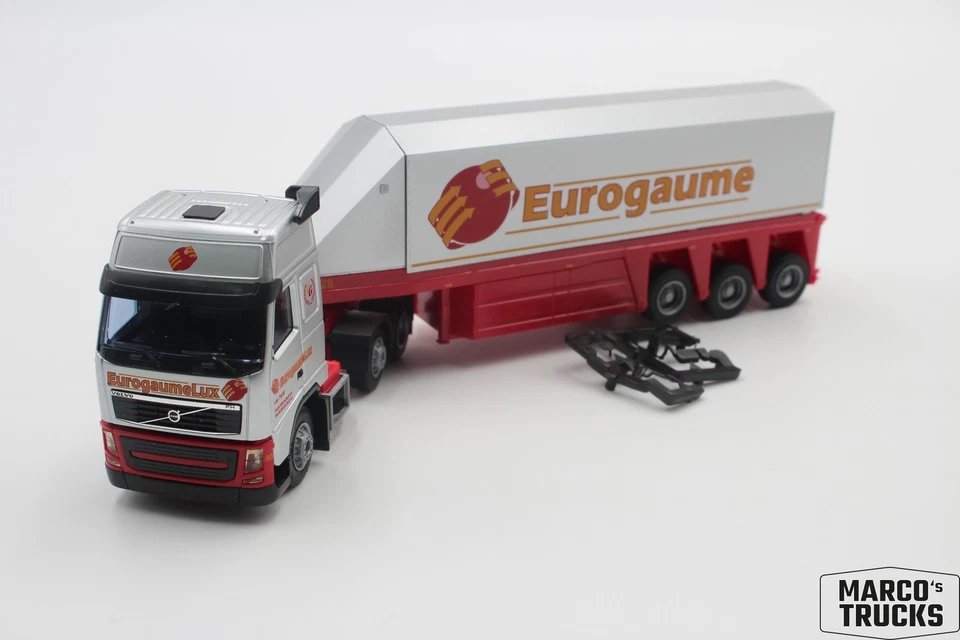 AWM Volvo FH13 glass semi-trailer truck "Eurogaume Luxemburg" 1:87 /AW3195 - Image 1 of 1