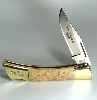 1985 CASE XX CUSTOM P197 LSSP SHARKTOOTH WITH INDONESIAN FOSSIL CORAL HANDLES - Image 1 of 4