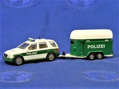 Coche de policía Siku 2310 Mercedes ML320 con remolque para caballos y caballos con Alemania 1/55 sin usar, en caja Foto 1 de 2