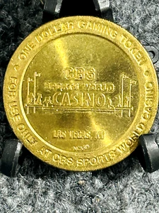 CBS Sports World Casino $1 Slot Gaming token Las Vegas Nevada NV Brass 1997 - Picture 1 of 2