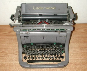 MACCHINA DA SCRIVERE MANUALE VINTAGE ANNI 40 UNDERWOOD MASTER CHAMPION GRIGIA - Foto 1 di 14