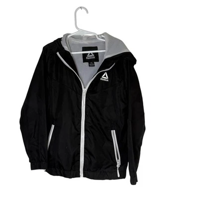 Chaqueta cortavientos negra para niños Reebok cremallera completa ropa deportiva ligera talla S 7/8 Foto 1 de 4