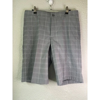Pantalones cortos de golf Slazenger a cuadros elásticos frente plano grises para hombre talla 32 Foto 1 de 4