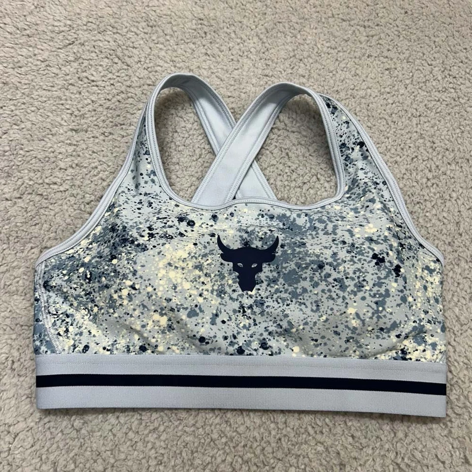 Sujetador deportivo mediano Under Armour Project Rock Foto 1 de 4