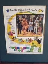 VTG LADIES HOME JOURNAL FOLLOW THE YELLOW BRICK ROAD TO OZ FRAMED AD.