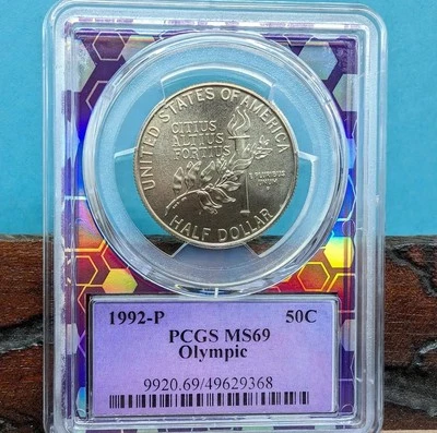 PCGS MS69 GRADED 1992 OLYMPIC FIFTY CENTS In Trader Bea Exclusive Coin Holder - Image 1 of 2