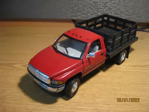 1/18 SCALE DODGE RAM 3500 DUALLY STAKE TRUCK IN RED / BLACK BY ANSON - Picture 1 of 17