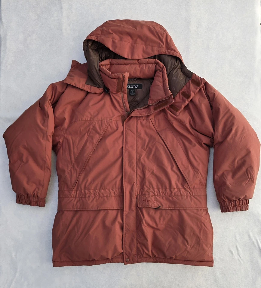 Chaqueta Marmot Para Hombres XL Marrón Óxido Parka Con Capucha Esquí Nieve Invierno Plumón de Ganso Cálida Foto 1 de 4