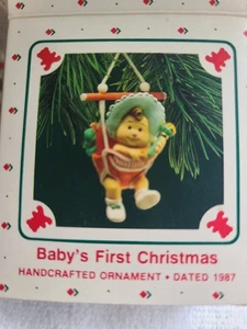 Hallmark Keepsake Ornament 1987 Baby's First Christmas Baby In Swing - Picture 1 of 3