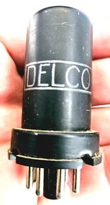 Tubo de radio negro Delco 12SK7 - Imagen 1 de 4