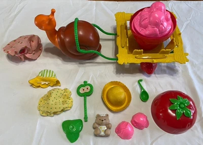 LOTE de piezas vintage Kenner Strawberry Shortcake carro caracol años 80 +++ Foto 1 de 4