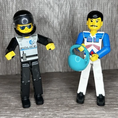 Vintage LEGO  Technic Figure tech029 (Police) and tech037 (Racecar Driver) Lot - Image 1 of 4