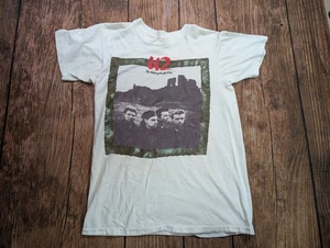 T-shirt vintage 1985 Tour U2 THE INDIMENTICABILE FIRE Band taglia L vestibilità M - Foto 1 di 12