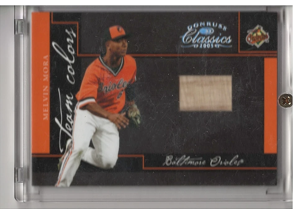 MELVIN MORA BALTIMORE ORIOLES 2005 DONRUSS 经典团队颜色球棒卡 6/100 — 第 1/2 张图片