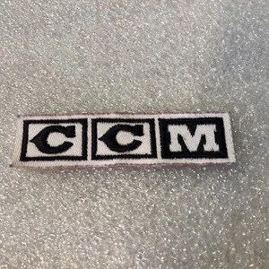 Vintage Black & White Embroidered CCM Hockey Jersey Manufacturer Sew On Patch - Picture 1 of 2