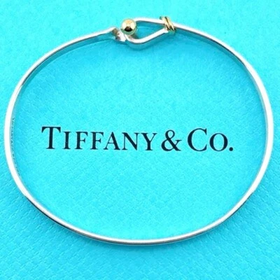 Bracelet Tiffany & Co. crochet et œil or jaune 18 carats 750 et argent 925 Japon - Photo 1/4